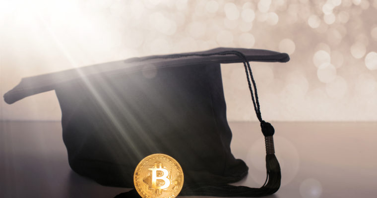 bitcoin education graduation cap blockchain