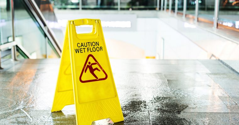 dow jones us stock market caution wet floor sign
