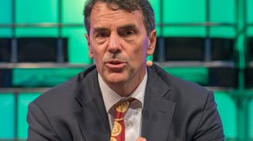 Silicon Valley’s Tim Draper, wearing a bitcoin tie, says crypto coins are good for humanity